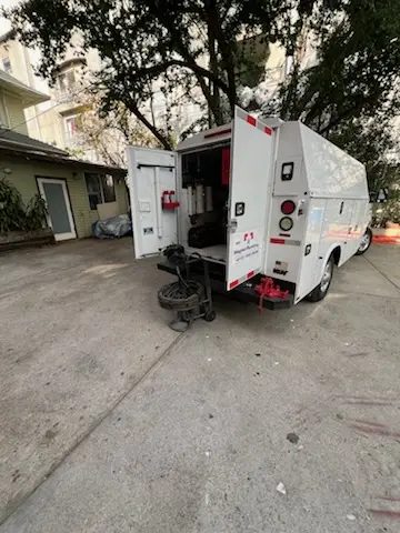 Magnet Plumbing service vehicle on-site for Water Heater Repair in Central North Miami